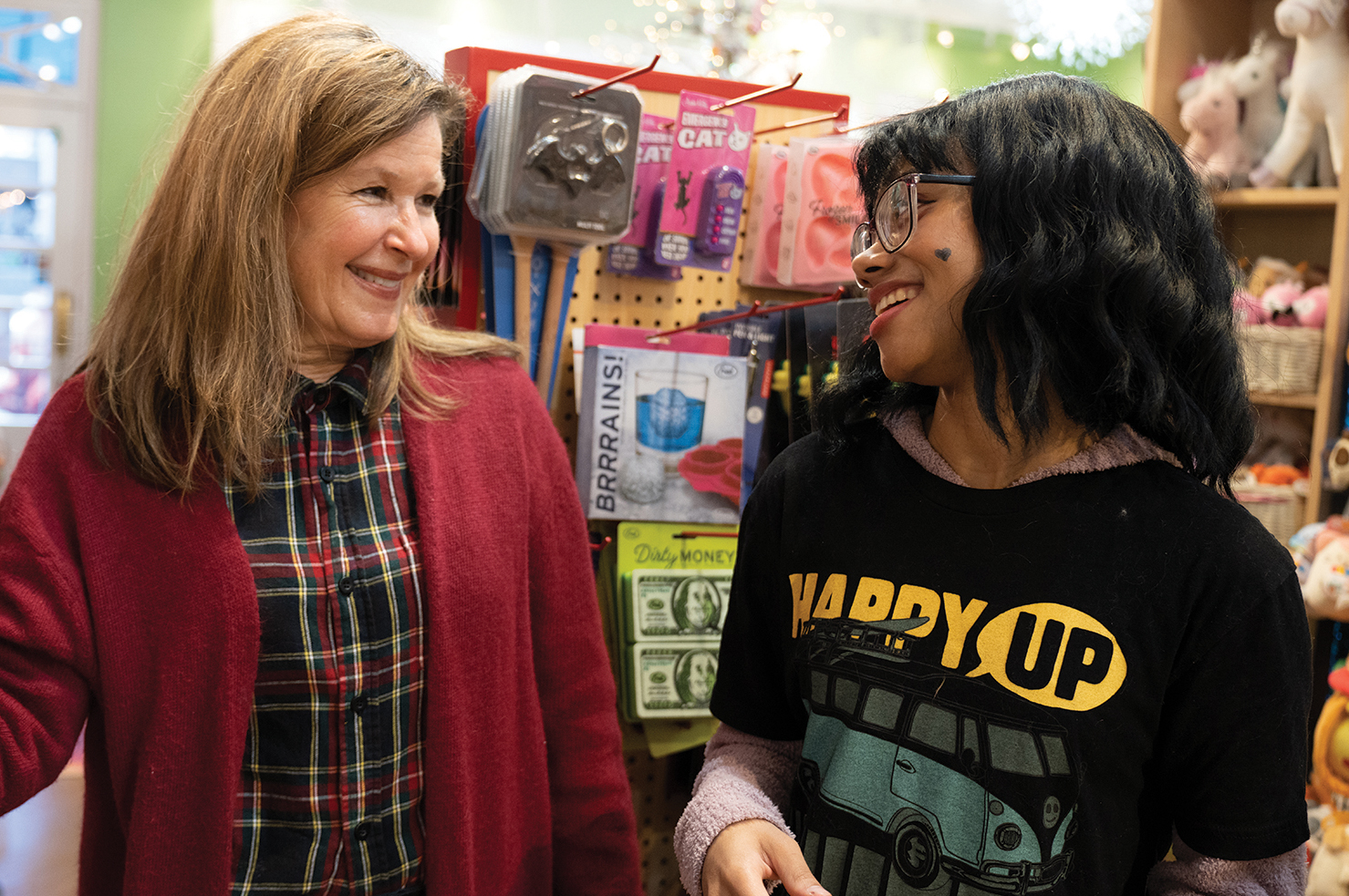Easterseals Midwest client BeLov’ed with her coach at Happy Up, Inc., a local toy store.